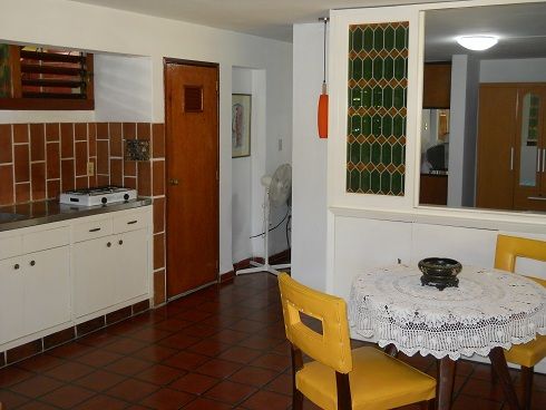 'Kitchen and dining room' is what you can see in this casa particular picture. Casas particulares are an alternative to hotels in Cuba. Check our website cuba-particular.com often for new casas.